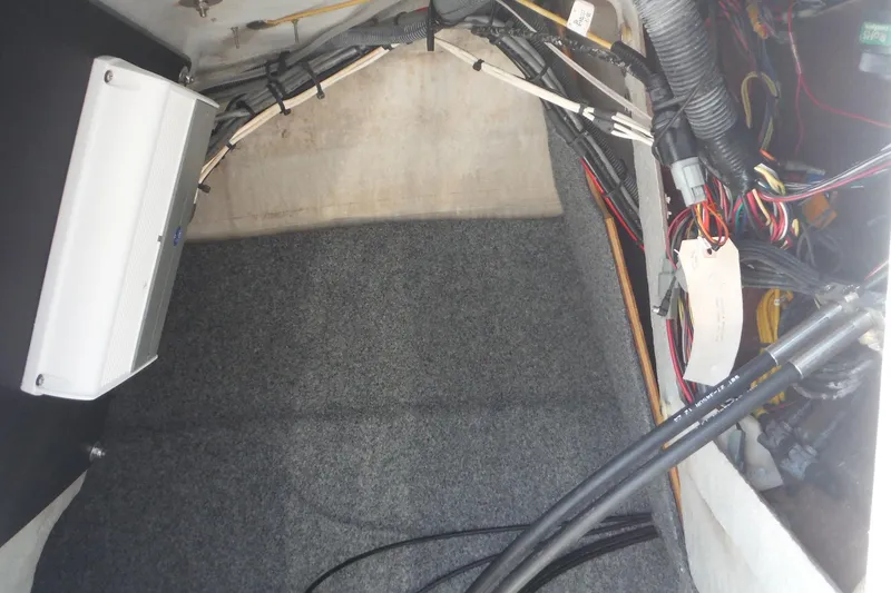 Slide: The Image of Interior wiring and components of a 2011 Yamaha Boats 242 Limited. - 19