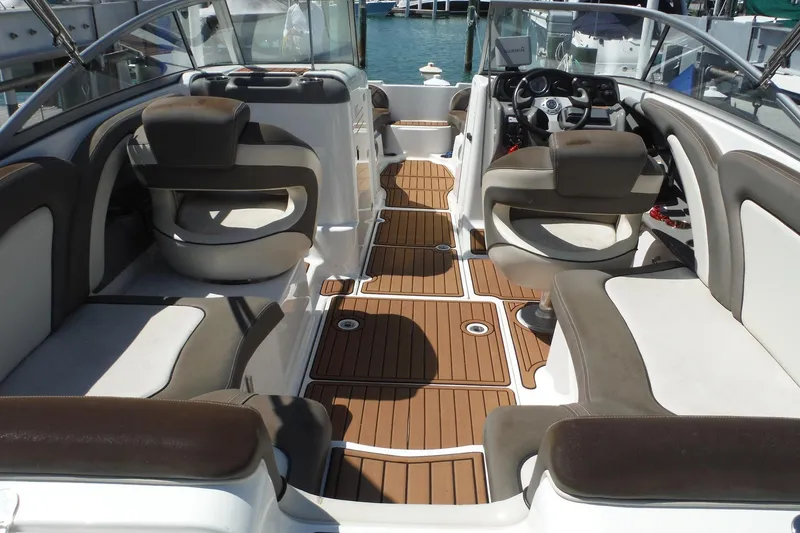 Slide: The Image of 2011 Yamaha Boats 242 Limited interior with plush seating and sleek design. - 3