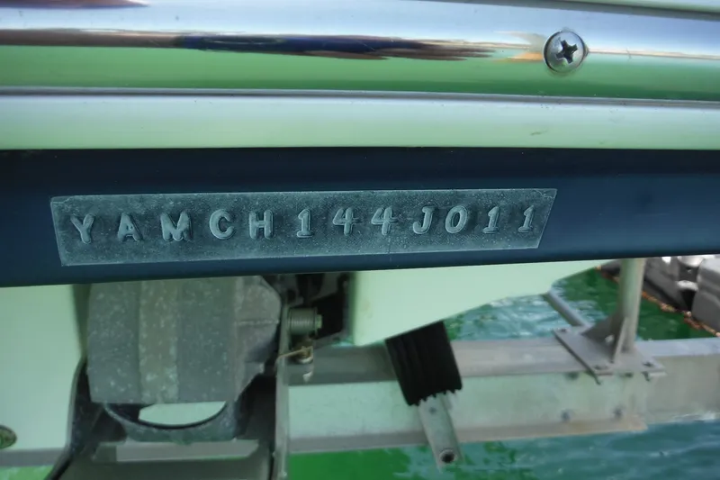 Slide: The Image of 2011 Yamaha Boats 242 Limited hull identification number on display. - 39