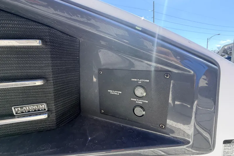 Slide: The Image of 2023 Cobalt A29 boat swim platform controls with Platinum Audio system. - 12