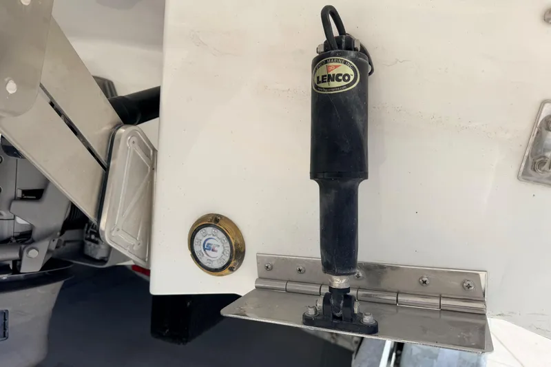 Slide: The Image of 2023 Cobalt A29 boat with Lenco trim tab actuator detail. - 26