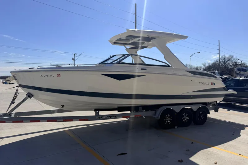 Slide: The Image of 2023 Cobalt A29 boat on trailer in parking lot, side view. - 4