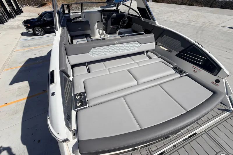 Slide: The Image of 2023 Cobalt A29 boat interior with luxurious seating and modern design. - 5