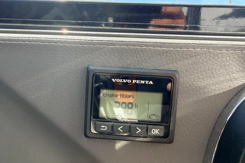 Slide: The Image of Volvo Penta engine hour meter displaying 298 hours on 2023 Cobalt A29 boat. - 19
