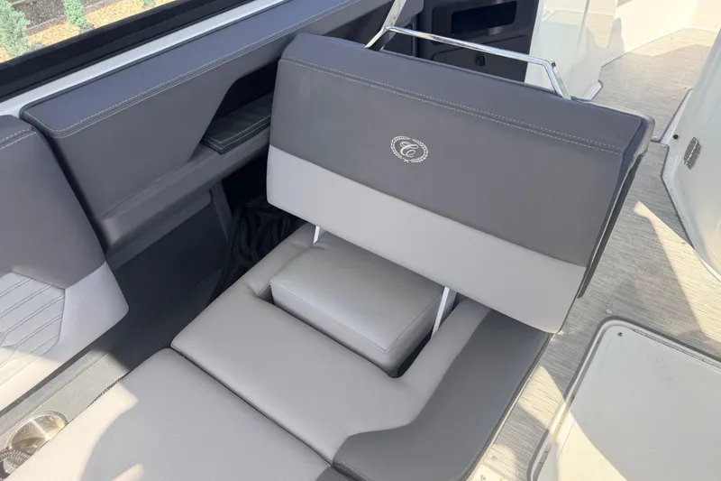 Slide: The Image of Luxurious seating in the 2023 Cobalt A29 boat, featuring elegant gray upholstery. - 9