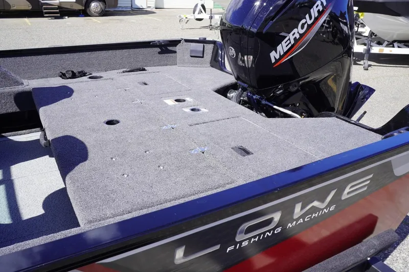 Slide: The Image of 2026 Lowe Fishing Machine 1675 WT with Mercury engine, spacious deck view. - 16