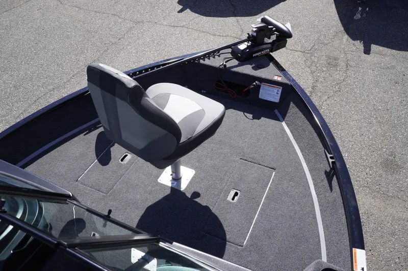 Slide: The Image of 2026 Lowe Fishing Machine 1675 WT boat with swivel seat and trolling motor. - 28