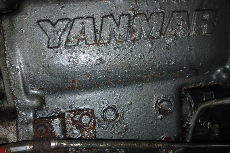 Slide: The Image of Close-up of a rusted Yanmar engine part from a 1994 Hunter 30 boat. - 15