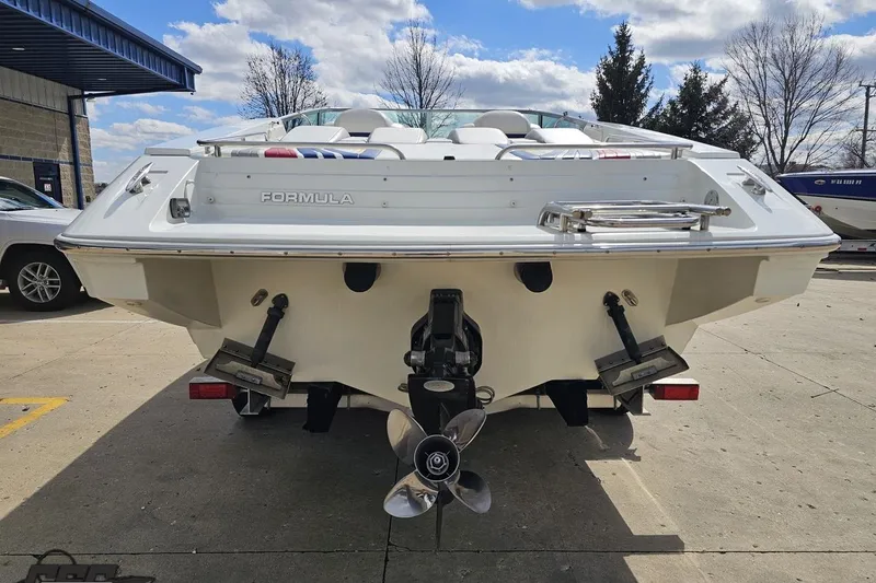 Slide: The Image of 2008 Formula 271 FASTech boat rear view, showcasing propeller and sleek design. - 25