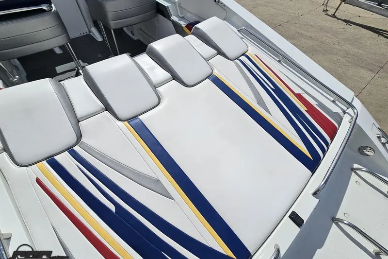 Slide: The Image of 2008 Formula 271 FASTech boat interior with colorful striped upholstery design. - 32