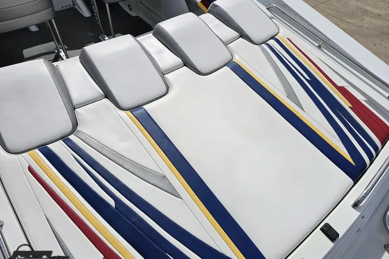 Slide: The Image of 2008 Formula 271 FASTech boat interior with colorful, striped upholstery design. - 33