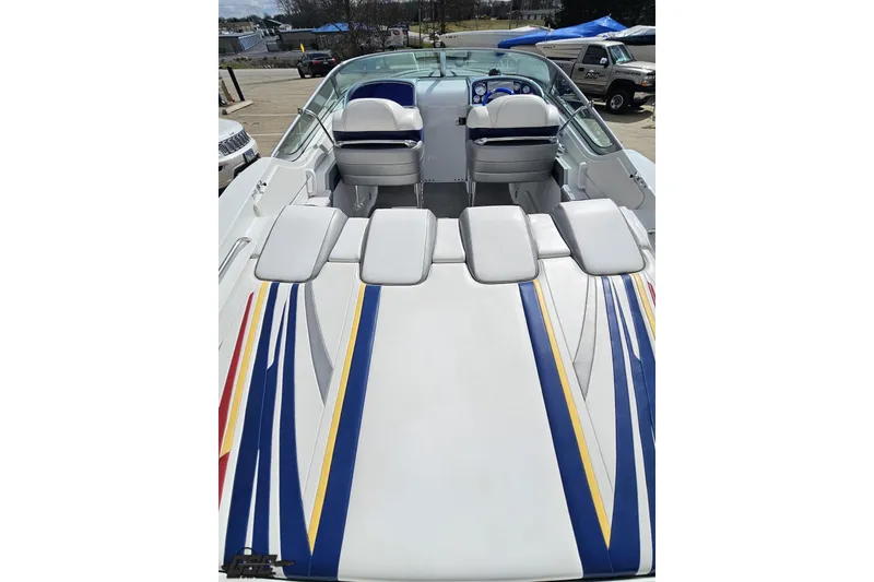 Slide: The Image of 2008 Formula 271 FASTech boat with colorful striped upholstery and dual seating. - 35