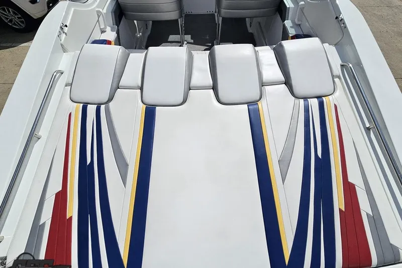 Slide: The Image of 2008 Formula 271 FASTech boat interior with colorful striped upholstery design. - 36