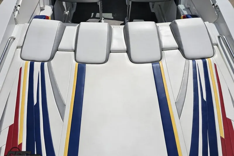 Slide: The Image of 2008 Formula 271 FASTech boat interior with colorful striped upholstery design. - 37