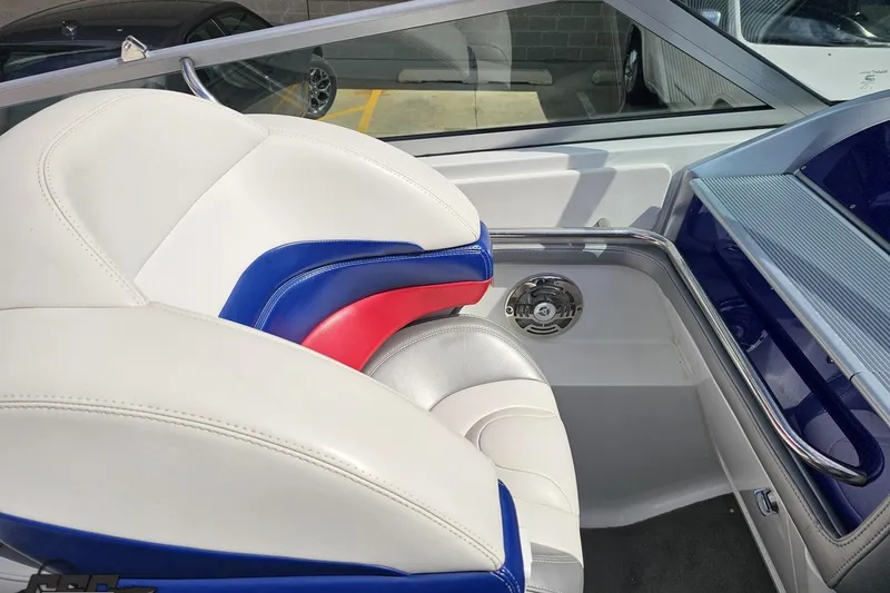 Slide: The Image of 2008 Formula 271 FASTech boat interior with white, blue, and red seating. - 45