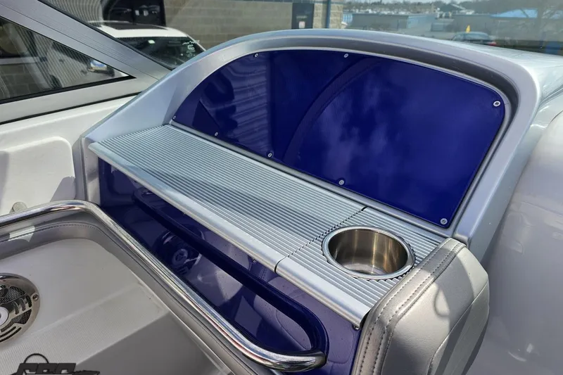 Slide: The Image of Interior of 2008 Formula 271 FASTech boat with blue accents and cup holder. - 47