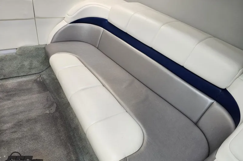 Slide: The Image of 2008 Formula 271 FASTech boat interior with white and gray seating. - 64