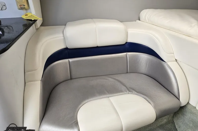 Slide: The Image of 2008 Formula 271 FASTech boat interior with stylish white and gray seating. - 69
