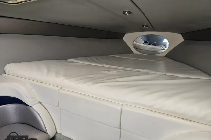 Slide: The Image of Interior cabin of 2008 Formula 271 FASTech boat with cushioned sleeping area. - 70