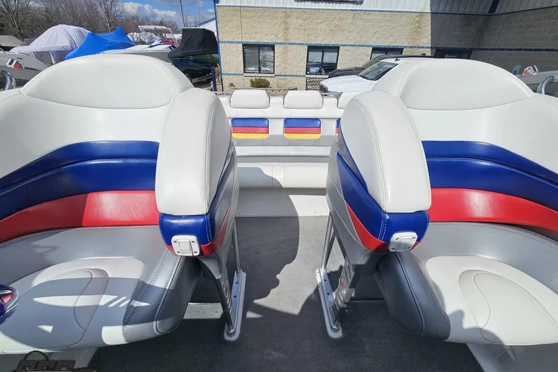 Slide: The Image of Interior of a 2008 Formula 271 FASTech boat with colorful seating and modern design. - 77