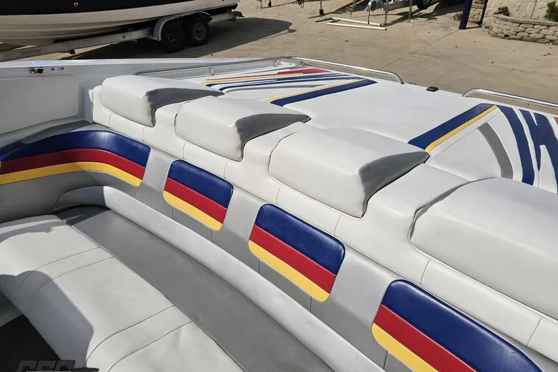 Slide: The Image of 2008 Formula 271 FASTech boat interior with colorful seating design. - 80