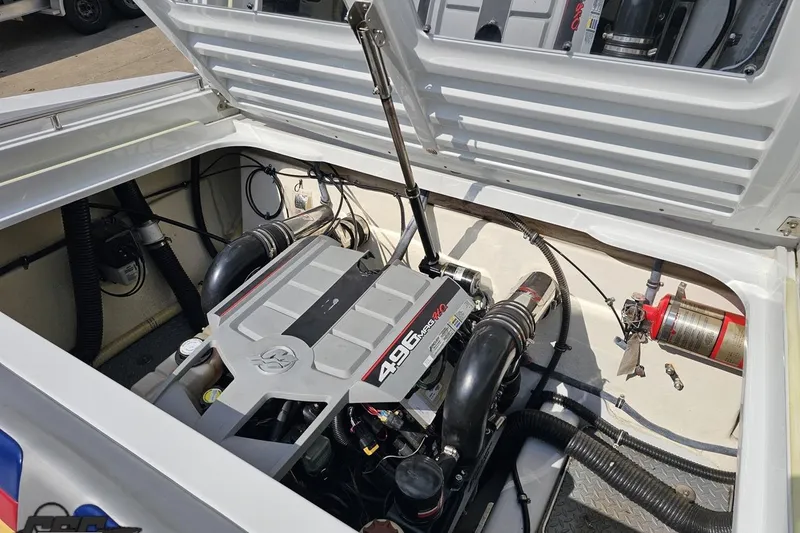 Slide: The Image of Engine compartment of a 2008 Formula 271 FASTech boat, featuring a 496 MAG engine. - 84