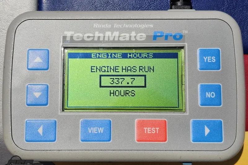 Slide: The Image of TechMate Pro device displaying engine hours: 337.7 for 2008 Formula 271 FASTech. - 87