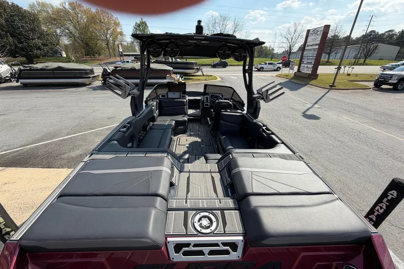 Slide: The Image of 2023 Supra SL 550 boat interior with spacious seating and modern design. - 12