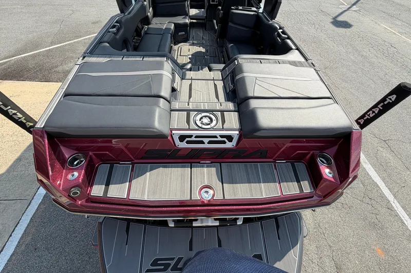 Slide: The Image of 2023 Supra SL 550 boat interior with sleek seating and modern design. - 13