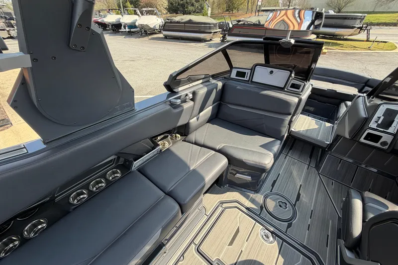 Slide: The Image of Luxurious interior of 2023 Supra SL 550 boat with sleek seating and modern design. - 18
