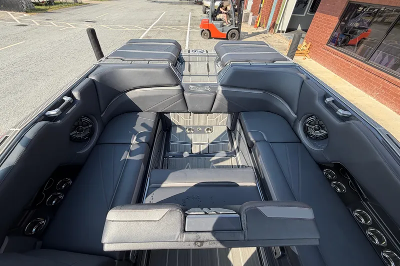 Slide: The Image of Luxurious interior of 2023 Supra SL 550 boat with sleek seating and modern design. - 23