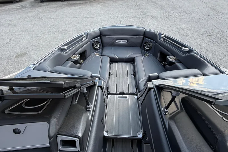Slide: The Image of 2023 Supra SL 550 boat interior with sleek seating and modern design. - 35