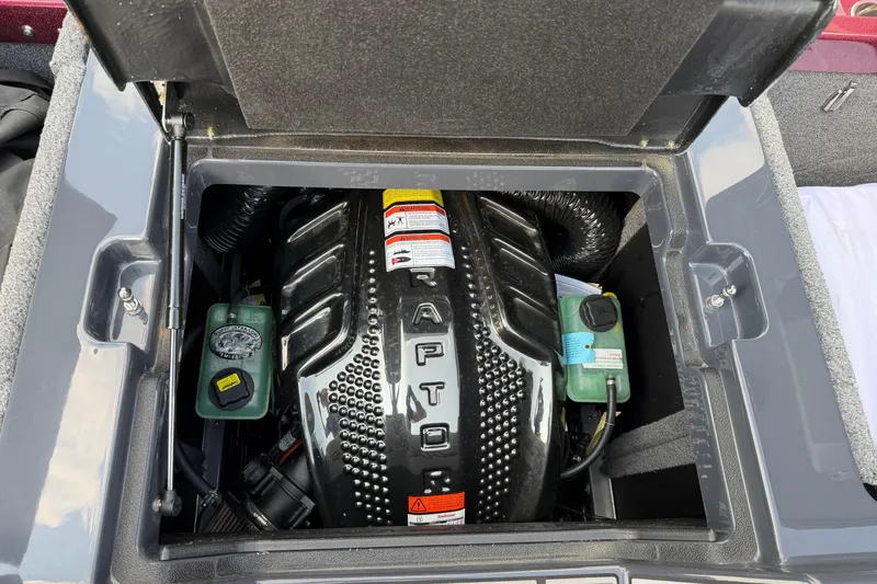 Slide: The Image of 2023 Supra SL 550 engine compartment with visible components and labels. - 36