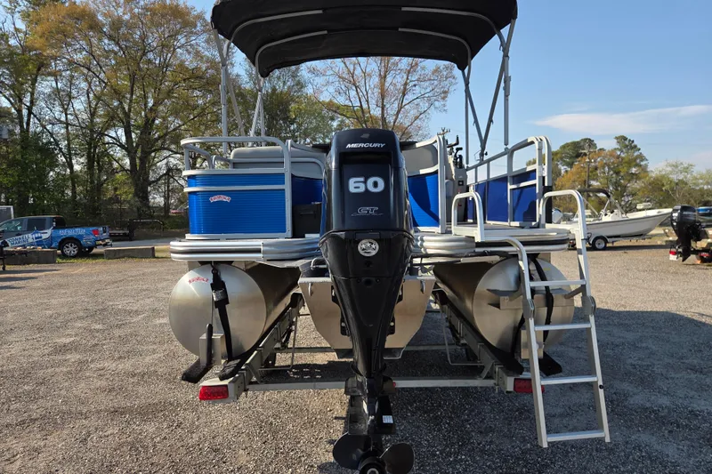 Slide: The Image of 2022 Lowe SF 194 Sport Fish boat with Mercury 60 engine, parked outdoors. - 6