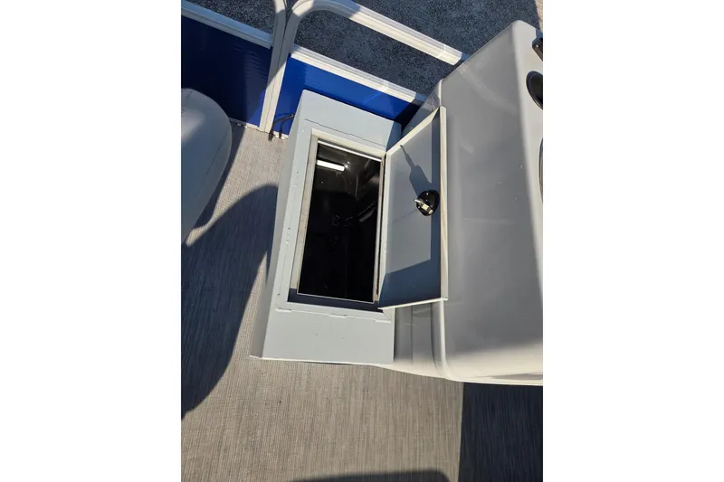 Slide: The Image of Open storage compartment on 2022 Lowe SF 194 Sport Fish boat deck. - 9