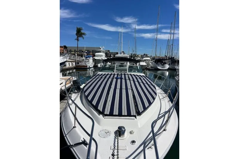 Slide: The Image of 1994 Sea Ray Sundancer 400 dashboard with gauges and navigation controls. - 12