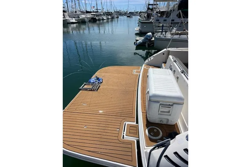 Slide: The Image of Control panel of a 1994 Sea Ray Sundancer 400 boat with multiple switches. - 16