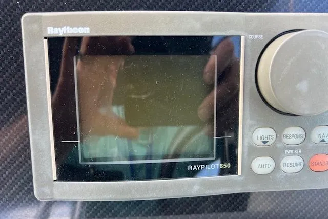 Slide: The Image of Close-up of mechanical components in a 1994 Sea Ray Sundancer 400 boat. - 22