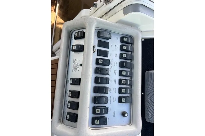 Slide: The Image of 1994 Sea Ray Sundancer 400 water filtration system with inlet and outlet pipes. - 24