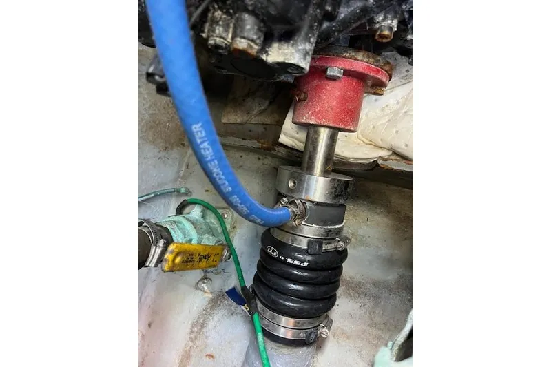 Slide: The Image of 1994 Sea Ray Sundancer 400 yacht docked at a marina under a clear blue sky. - 30