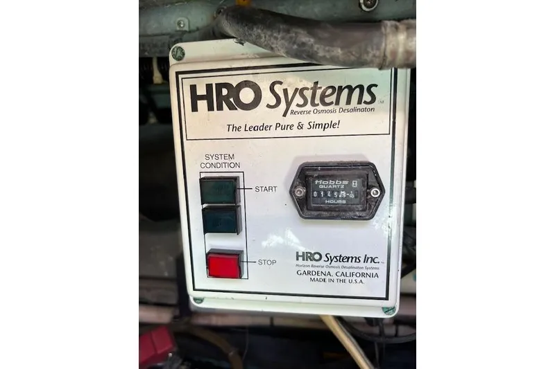 Slide: The Image of 1994 Sea Ray Sundancer 400 yacht docked at marina under clear blue sky. - 31