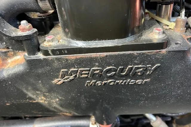 Slide: The Image of Luxurious interior of a 1994 Sea Ray 400 Express Cruiser with curved seating and modern decor. - 33