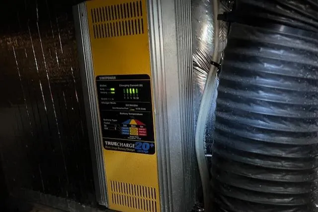 Slide: The Image of JL Audio system in a 1994 Sea Ray 400 Express Cruiser cabin. - 34