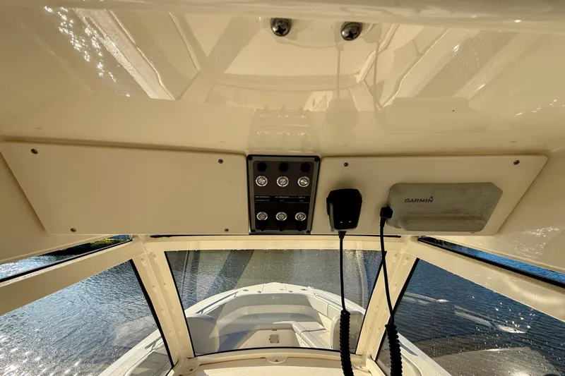 Slide: The Image of Interior view of 2022 Scout 277 LXF boat with Garmin navigation system. - 23