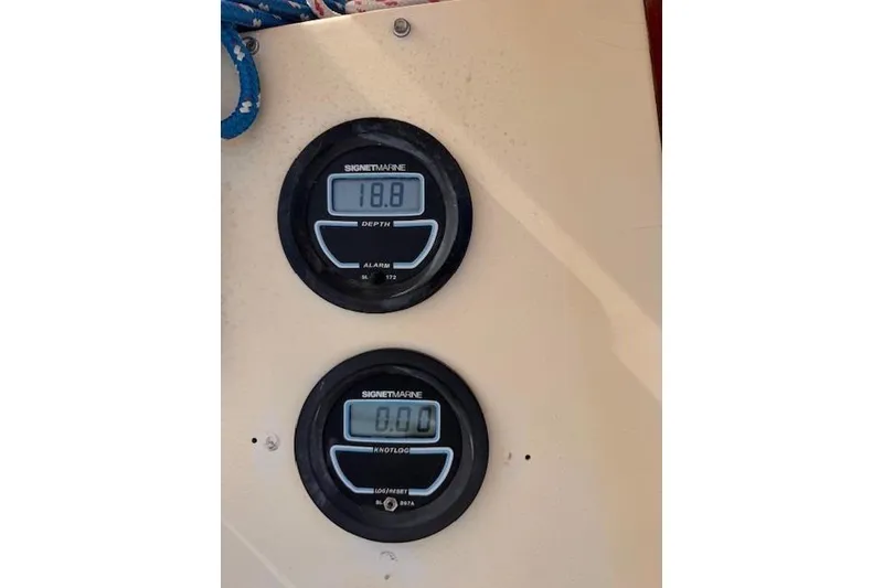 Slide: The Image of Digital depth and knot log gauges on a 1977 Islander 32 sailboat. - 8