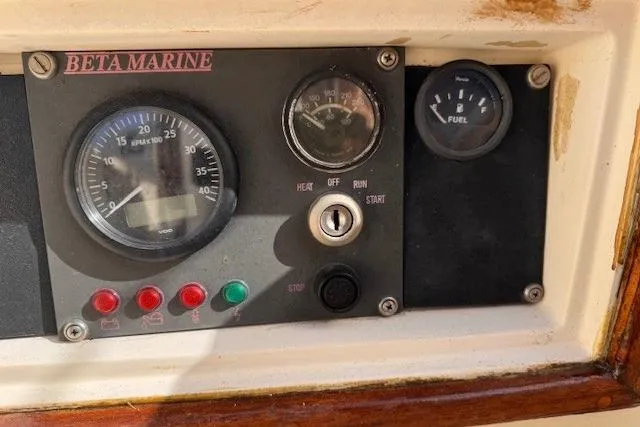 Slide: The Image of Control panel of a 1977 Islander 32 sailboat with Beta Marine gauges. - 9