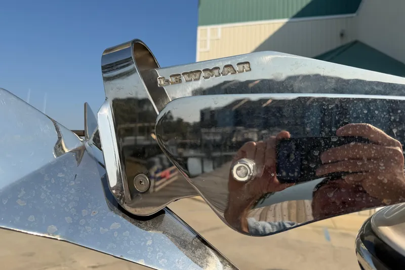 Slide: The Image of Close-up of Lewmar anchor on 2024 Grady-White Fisherman 236 boat, reflecting surroundings. - 15