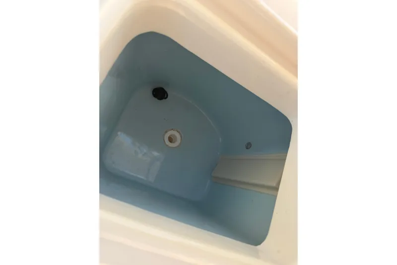 Slide: The Image of Livewell compartment of 2024 Grady-White Fisherman 236 boat. - 31