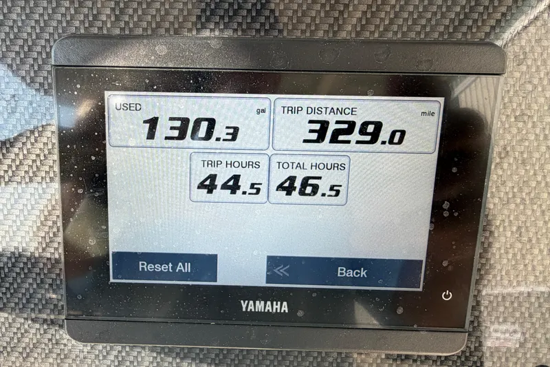 Slide: The Image of Yamaha display showing fuel usage and trip data for 2024 Grady-White Fisherman 236. - 38