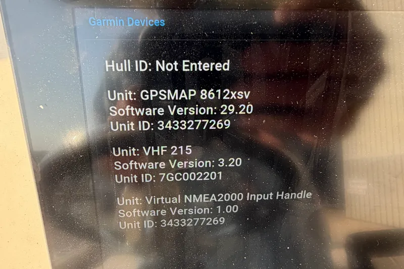 Slide: The Image of Garmin device display on 2024 Grady-White Fisherman 236, showing software versions and unit IDs. - 40